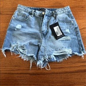 Pretty little thing distressed shorts (SOLD)